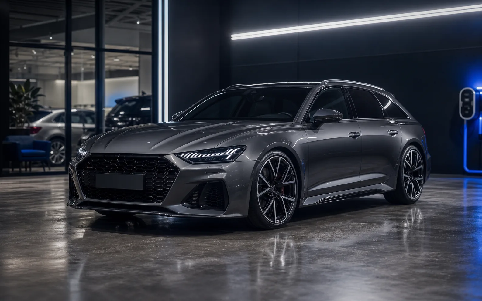 Dark graphite executive touring car in a premium inspection studio